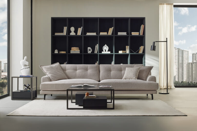 Milan Sofa beige - living room interior with coffee table and bookshelf