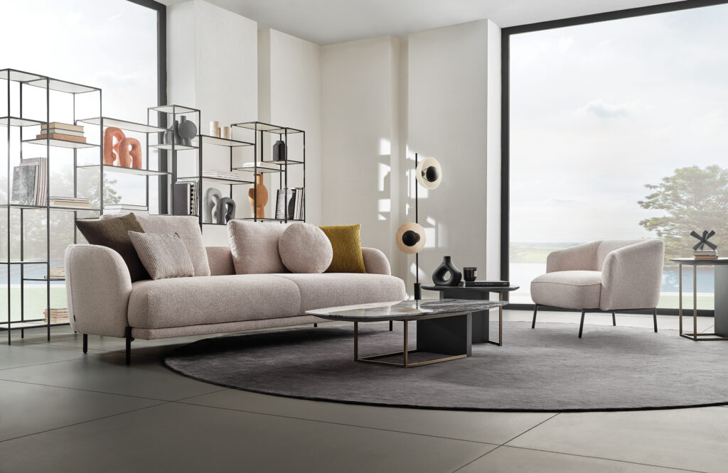 Enza Home Seoul 3-Seater Sofa in Beige Fabric—feather-filled cushions in a modern living room