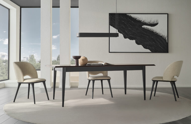 Parma dining room set with Parma extendable dining table and comfort chairs in a styled interior